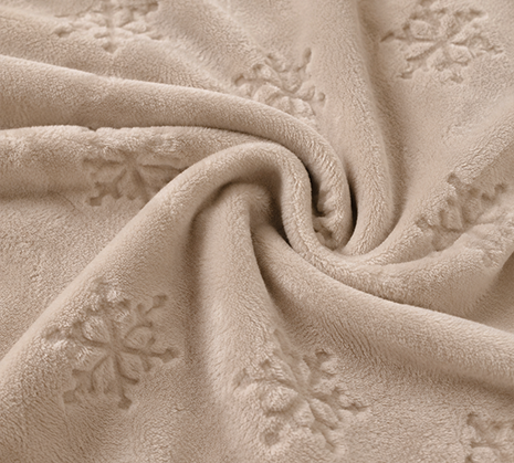 Snowflake cut flower flannel blanket, soft fabric texture close-up shot