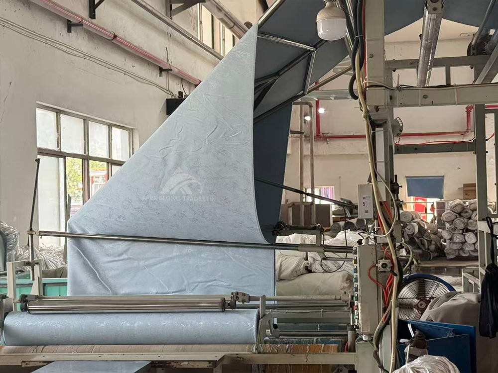 Textile factory workshop folding wide fabric for finished blanket and home textile products