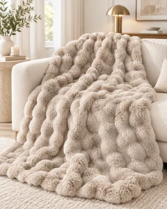 faux rabbit fur blanket, draped sofa display, elegant home decor