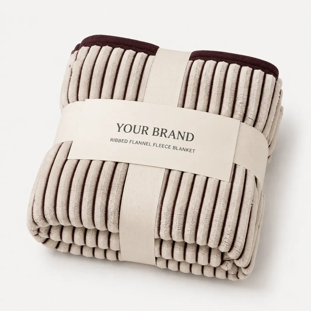 Ribbed flannel fleece blanket, paper belly band, gift‑ready home textile
